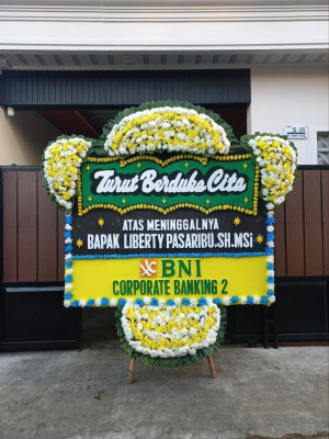 Papan Bunga Duka di Batudaa Pantai