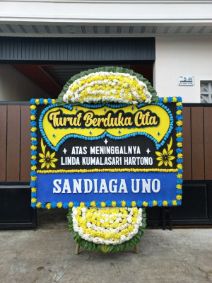 Papan Bunga Duka di Batudaa Pantai